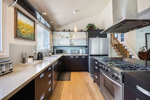 Beautiful modern kitchen with gas stove.