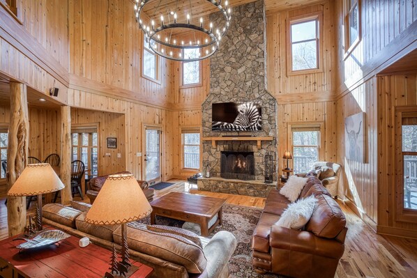 Gather around the fireplace in the living Room