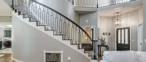 Circular stair case to the 2 upstairs bedrooms.