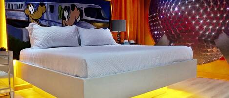 Epcot King bedroom with 55” smart TV and en suite bathroom