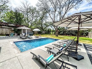 Dive into relaxation with a sparkling private pool, soothing hot tub, and spacious patio—perfect for sunbathing, entertaining, or unwinding in total comfort. This outdoor oasis offers the ultimate vacation vibes from sunrise to sunset. Book your stay now and experience the best in poolside living!