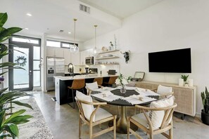 Stylish space with unique flair. Savor meals in a chic dining area adorned with vibrant local decor and modern finishes!