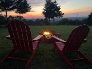 Enjoy the expansive views and sunset while warming up at the fire pit.