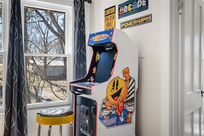 Video game features pacman, galaga, dig dug and other games