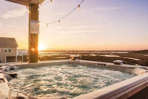 Unwind in our hot tub, perfectly positioned for you to soak in breathtaking views, blending relaxation with a stunning backdrop