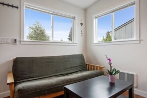 Comfortable futon, which opens to a full size bed.