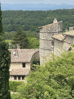 Views from the terrace of the Rhone Valley, Ardeche mountains and village