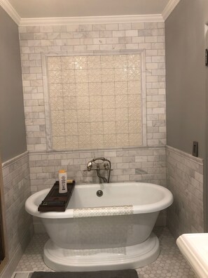 Main Bathroom with Standing Bathtub and Shower
