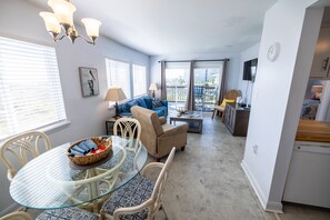 View of dining and living room areas from foyer.