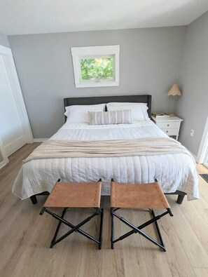 Master bedroom with a king bed.