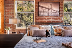 Relax and unwind in this cozy, inviting bedroom, where comfort and serenity meet for the perfect night's rest.