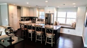 Huge Chefs Kitchen with 360 custom bar stools