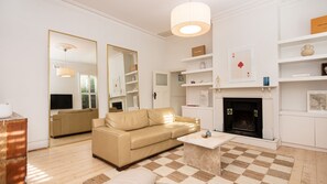 Living room with open fire place