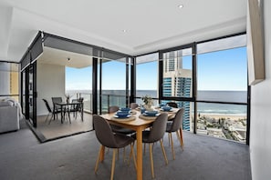 Sophisticated dining area overlooking the ocean and the city