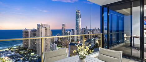 Balcony with the scenic ocean and city views