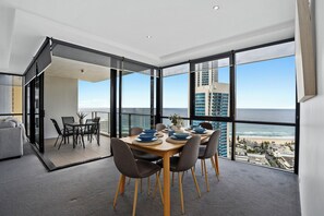 Sophisticated dining area overlooking the ocean and the city