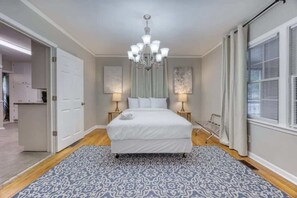 Master bedroom with beautiful chandelier