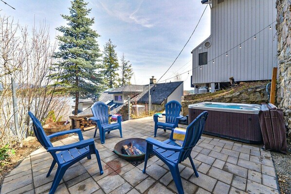 Newman Lake view and Mount Spokane View from this private patio with fire pit and hot tub. 