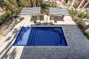 The pool are is perfect for swimming, lounging or playing. The deck is furnished with comfortable shaded lounge chairs & seating.  Also, the pool itself has two corner seats and an oversized sun shelf (perfect for the little ones to play on!)