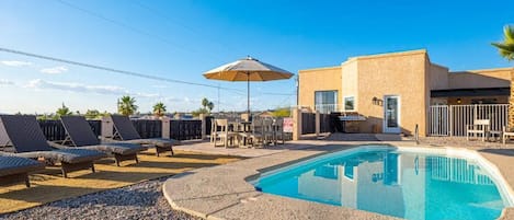 Side door from kitchen to pool.