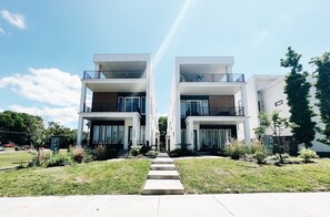 three story home with two large decks with downtown views