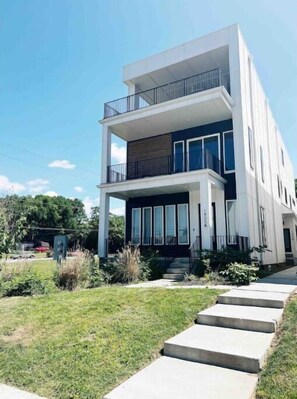 three story home with two large decks