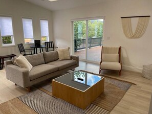 The living room area provides plenty of seating for your group