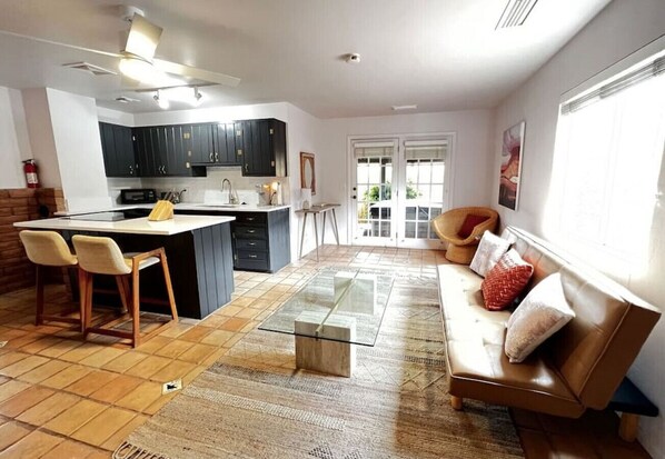 Modern and updated living room and kitchen in this casita