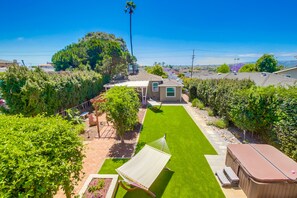 Upper level balcony view of the communal yard, second floor unit