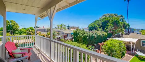 Bird's eye view of the shared backyard with hammocks, hot tub, fire pit, lounge chairs, dining tables and meditation cove!