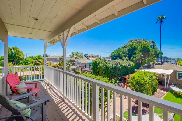 Bird's eye view of the shared backyard with hammocks, hot tub, fire pit, lounge chairs, dining tables and meditation cove!