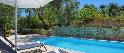 Sit back and relax in style around amazing private pool