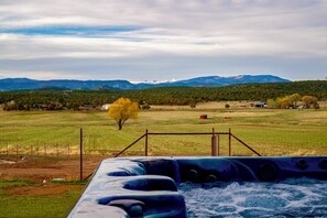 7 person hot tub with sweeping mountain views.