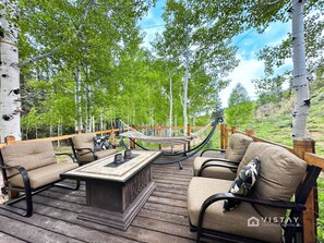 Let’s take a moment and have a little chit-chat in this cozy outdoor seating area.