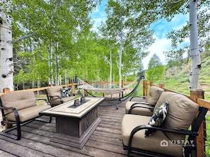 Let’s take a moment and have a little chit-chat in this cozy outdoor seating area.