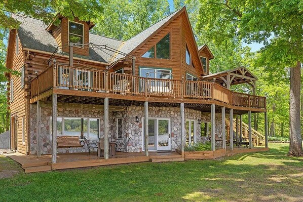 Lakeside serenity awaits at this rustic log cabin