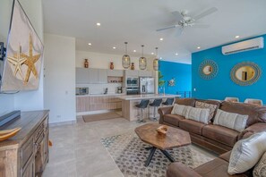 Villa Tempisque's bright and cozy living, dining and kitchen space.