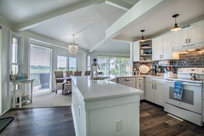 View from kitchen looking through dining and living room areas