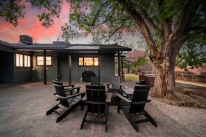 Gather around the fire pit with loved ones to relax after a day of adventure