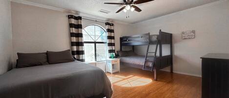 Guest Room with queen bed and Bunk beds