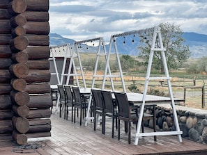 Outdoor dining for 18 people - lights, privacy, and mountain views!