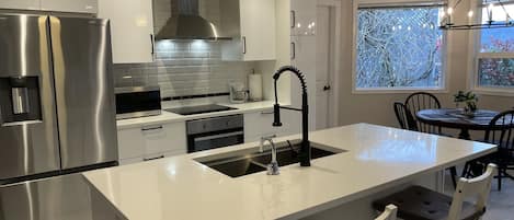 Gourmet kitchen with granite countertops and high end appliances.  Enjoy!