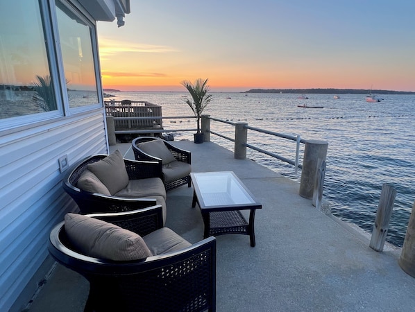 enjoy happy hour over looking the bay