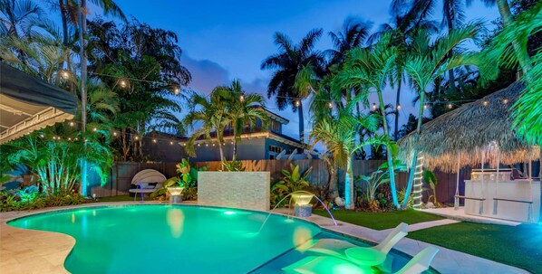 Outdoor Oasis with Heated Pool, Lighting, Magic Bowls, Waterfall, Tiki Hut, Hammock, Swings, BBQ, Outdoor Table, Sound system & More!!