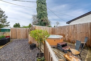 Private enclosed garden and patio with hot tub