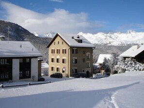 Chesa Nadig from the East, from the Languard Meadow with direct access to the skiing and sleding slopes.