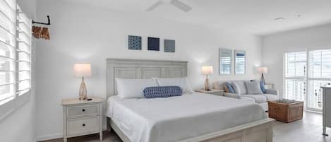 Master bedroom with King bed; Ceiling fan; Large Dresser and clothing rack