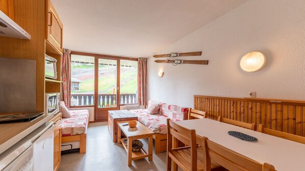 Bright living room with a view from the ski runs