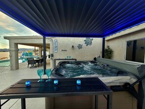 Our hot tub features a waterfall and multiple lighting choices. Perfect for welcoming the morning with a cup of coffee or relax and unwind after an active day of fun in Lake Havasu.