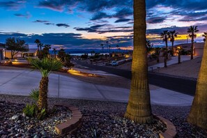 Stunning view of Lake Havasu, where azure waters meet clear skies. The sun-kissed landscape paints a picturesque scene, inviting you to savor every moment in this haven of natural beauty.